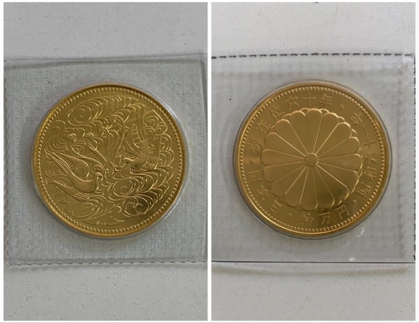 天皇陛下御在位六十年記念拾万円金貨